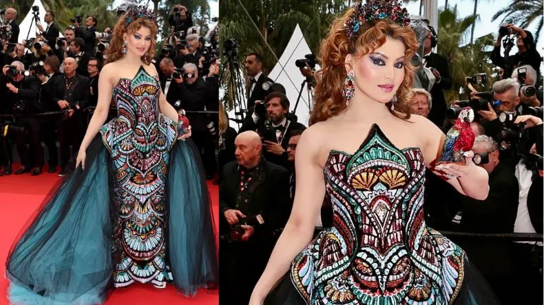 सिर पर ताज, स्ट्रैपलेस ड्रेस और 4 लाख का तोता लेकर पहुंचीं Urvashi Rautela, यूजर्स बोले – जादूगरनी लग रही है!